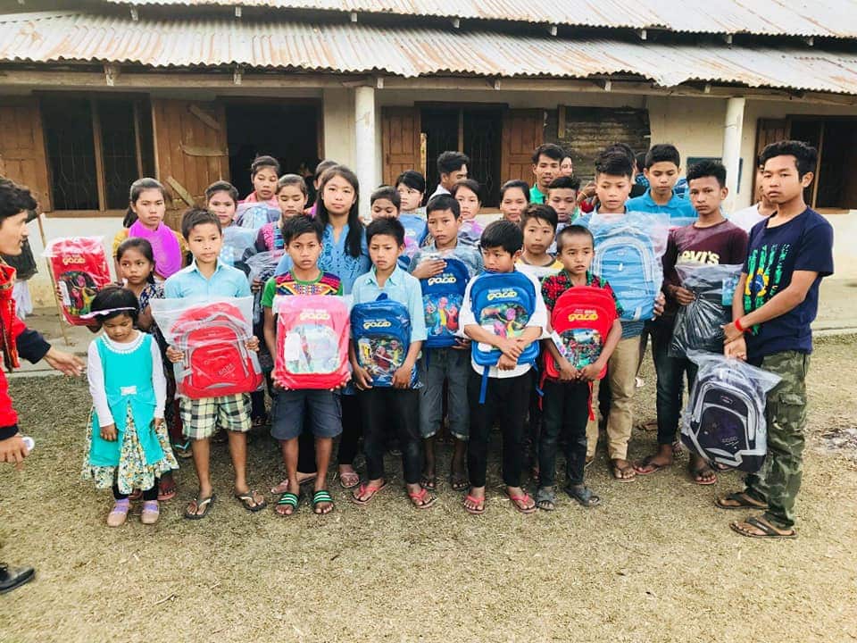 Nairwng after donating educationa material to an orphanage at her birthplace.