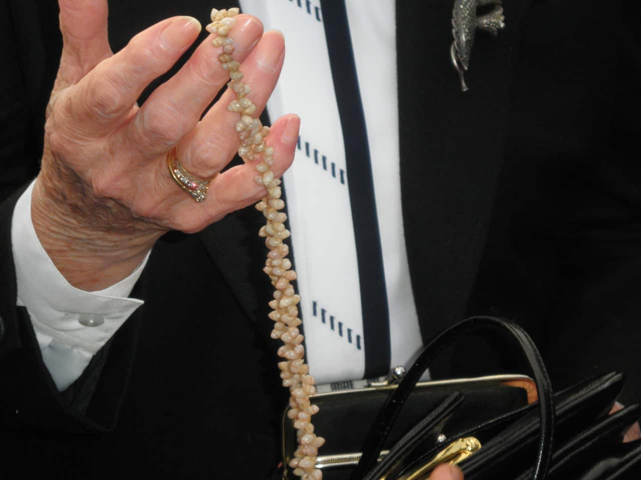 A necklace made with seashells, which Warrnambool resident Avis Quarrel believes was hand made by Pooran Singh and gifted to her