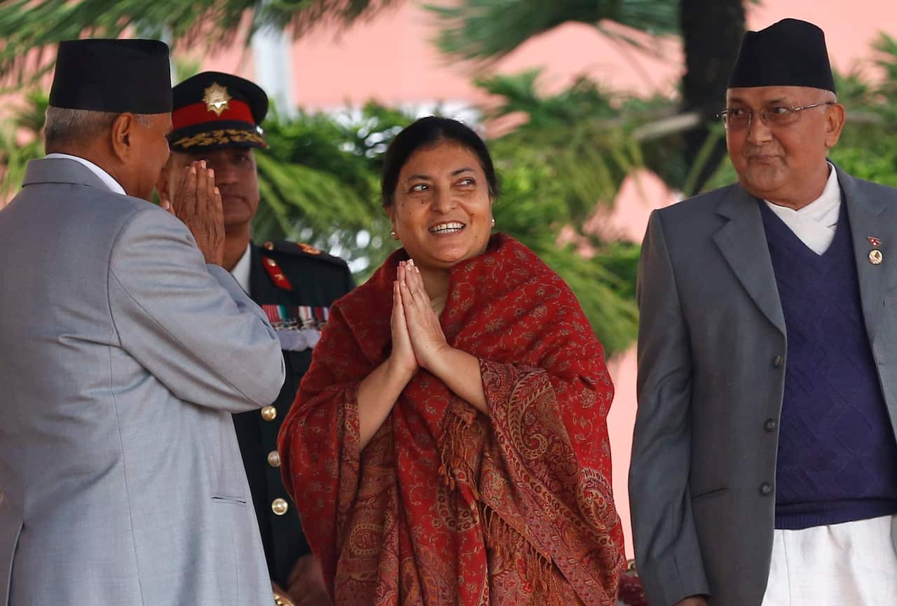 Nepal's first elected female president Bidhya Bhandari (C) President Ram Baran Yadav (L) Prime Minister KP Sharma Oli (R) in Kathmandu, Nepal, 29 October 2015.