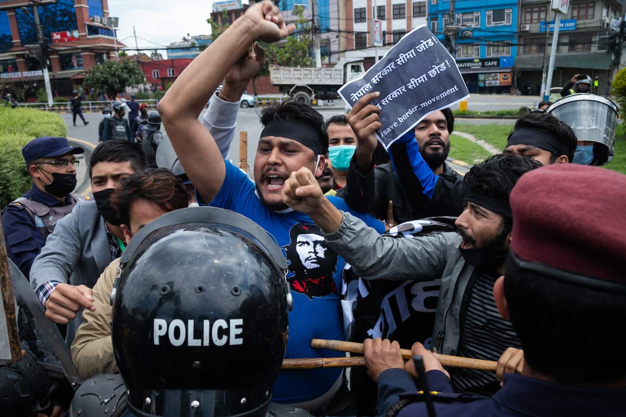 Police detained students in Kathmandu against Indian government announcement to open a link road within Nepal.