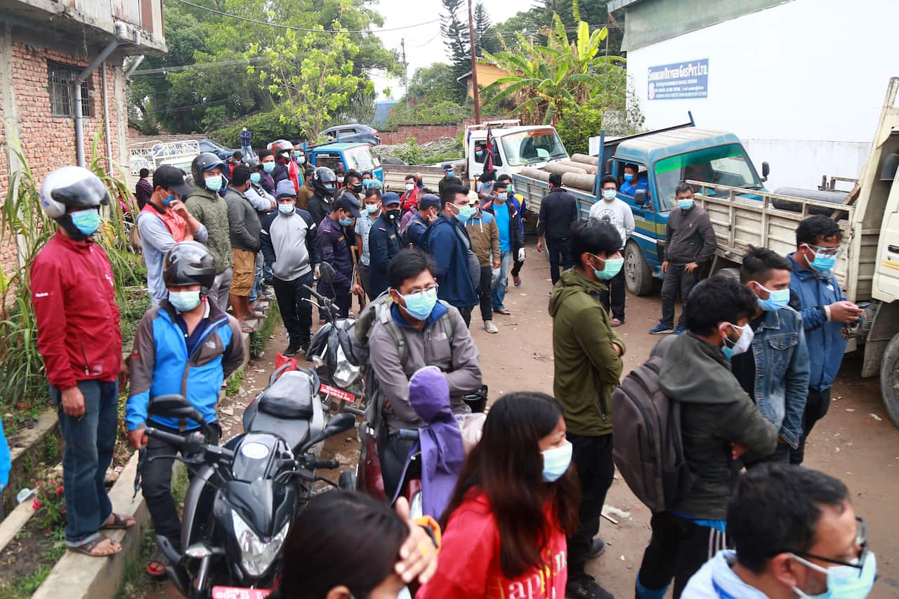 People in Nepal lining up outside an oxygen production plant in Kathmandu