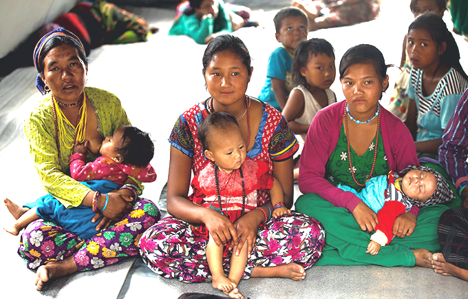Nepali women and children at a camp setup by Dr Ray Hodgson