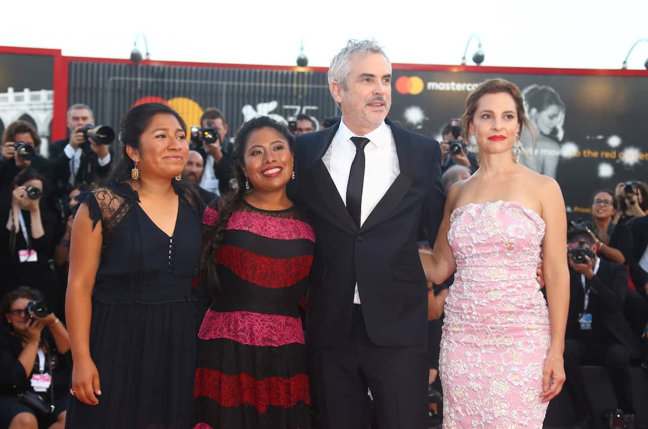 Yalitza Aparicio with Roma cast members, and director Alfonso Cuaron at the premiere of the film 'Roma' at the 75th edition of the Venice Film Festival.