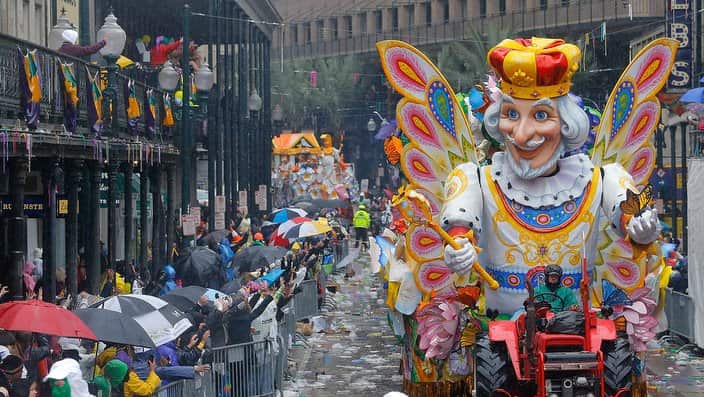 The Butterfly King float makes its way toward the Canal Street turn on during a Mardi Gras parade, Tuesday, March 4, 2014, in New Orleans.   AAP Image/AP Photo/NOLA.com The Times-Picayune, David Grunfeld