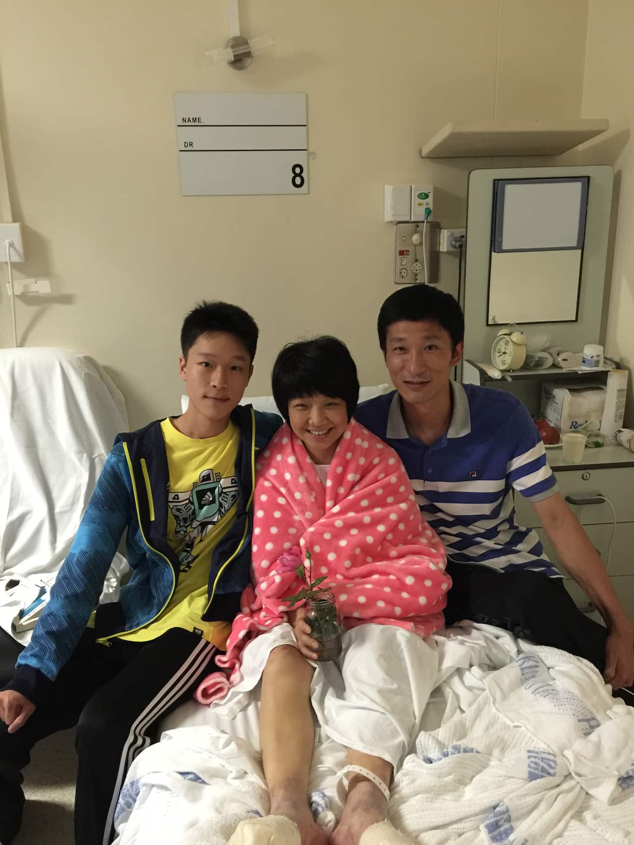 Tina, Michael and their son in hospital on New Year's Day in 2014.