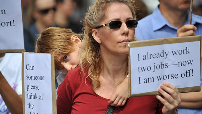 People protesting in Australia against government cuts