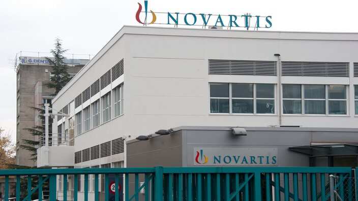 FILE - file photo shows the entrance of a Novartis production site in Nyon, Switzerland. 