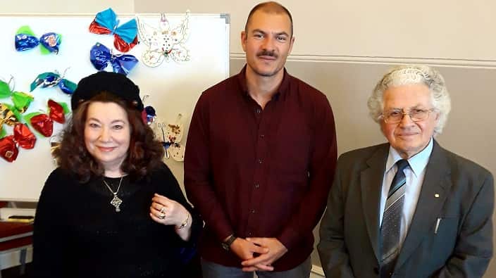 Greek Australian writer Dina Amanatides, her partners Kyriakos Amanatides with SBS Greek's Panos Apostolou