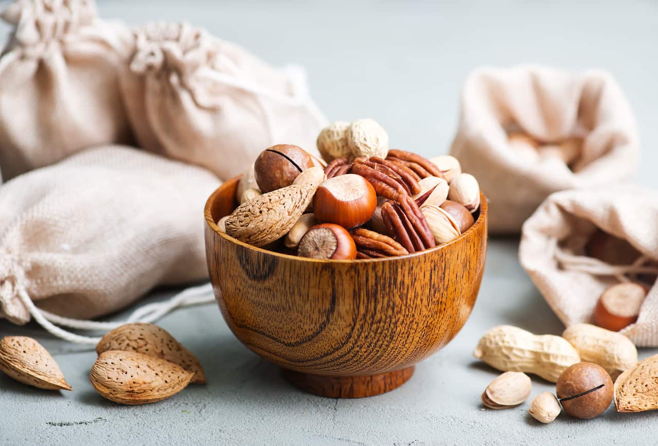 nuts on a table, different kind of nuts