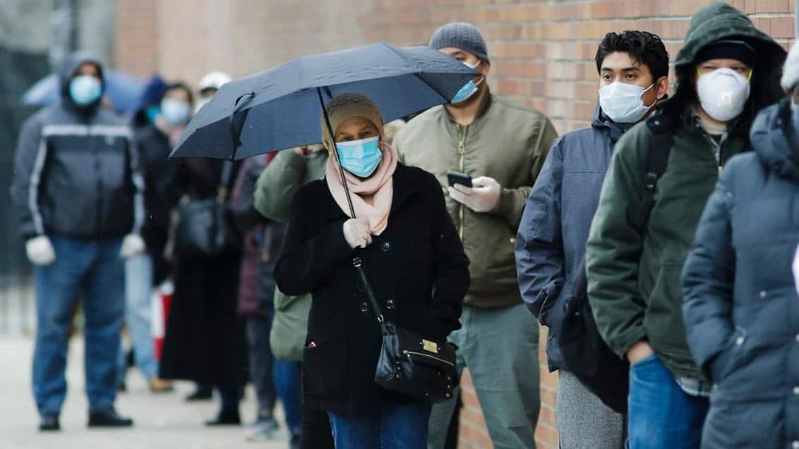 People line up at Gotham Health East New York, a COVID-19 testing centre in Brooklyn