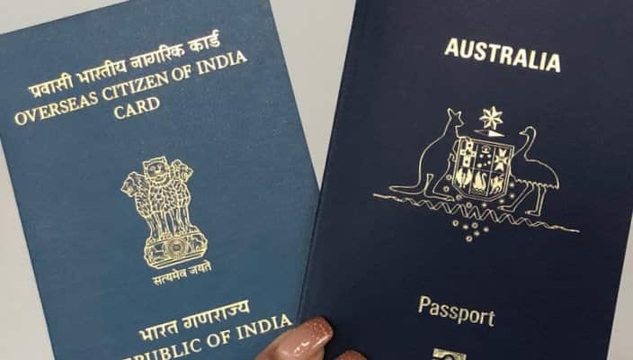 OCI card which is meant to be a lifelong visa, and an Australian passport