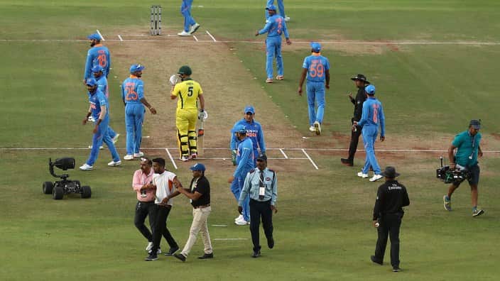 A spectator runs onto the pitch during game two of the One Day International series between India and Australia at Nagpur.