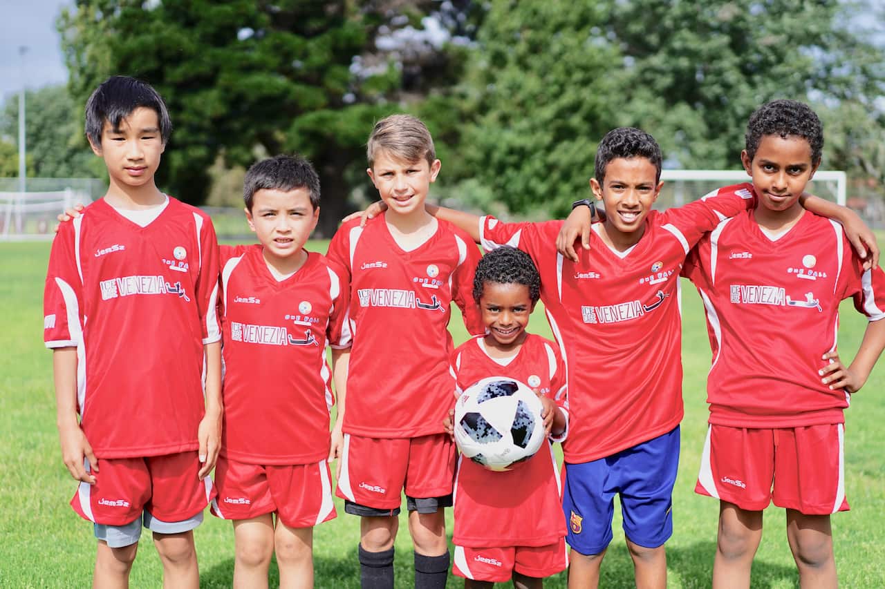 one-ball-sbs-tigrinya-refugee-kids-soccer (1)               