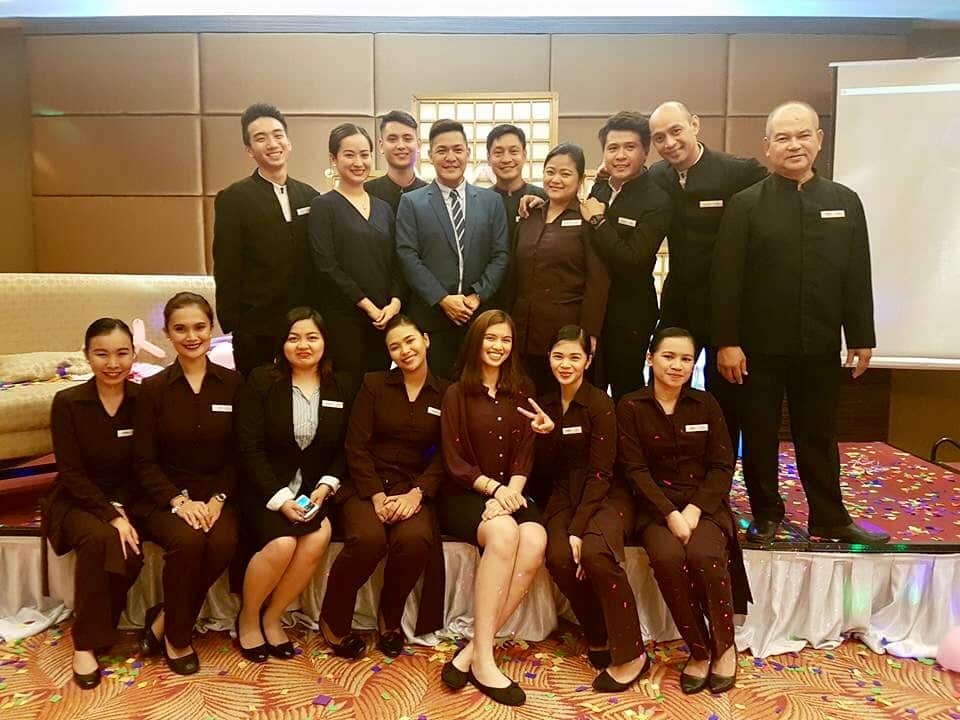 Owen Alarcon with the Crowne Plaza Manila Galleria staff on his last day as Manager.