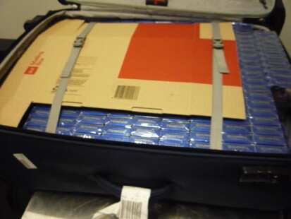  $55,000 fine over tobacco filled suitcases.