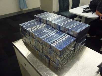  $55,000 fine over tobacco filled suitcases.