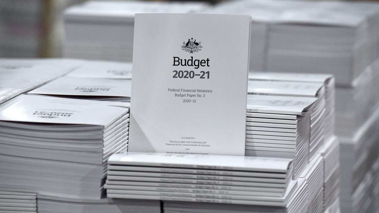 The 2020-2021 Budget Papers are seen at a printing facility prior to being delivered to Parliament House
