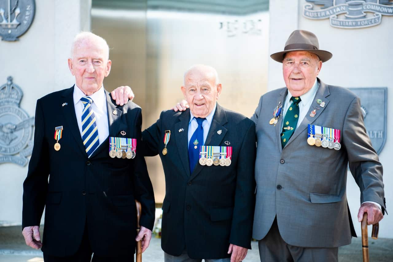 Korean war veterans(left to right) Tom Parkinson, Mick Griffin and Colin Berryman following the commemorative service for the 65th anniversary of the Korean War Armistice