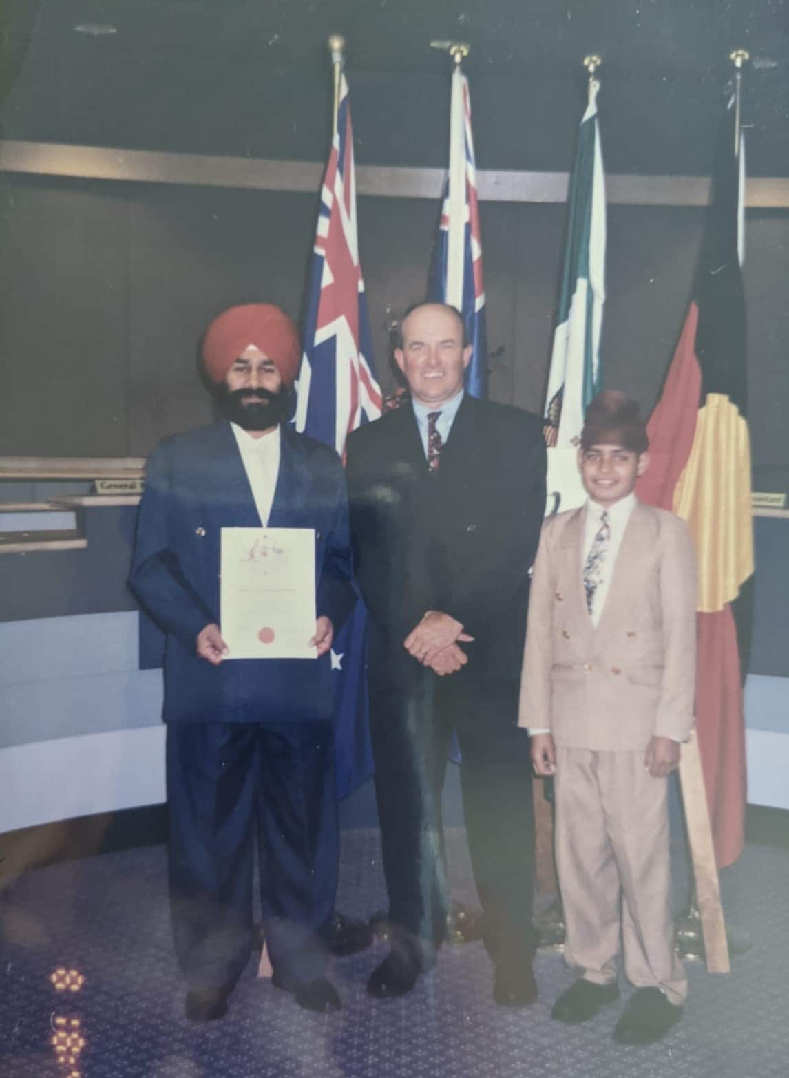 Devinder Singh Dharia and his son Pav Dharia at thier citizenship ceremony.
