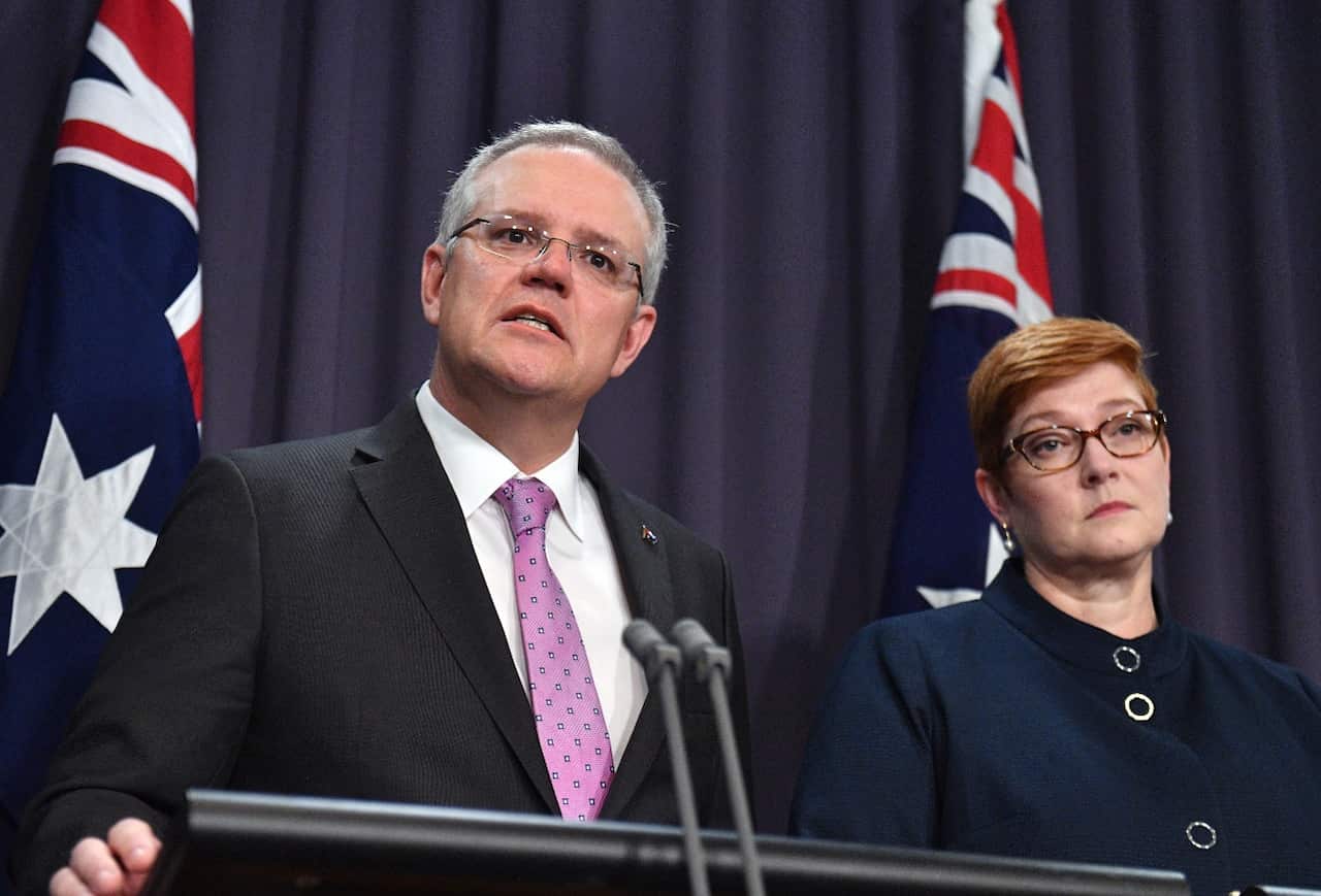 Prime Minister Scott Morrison speaks to the media alongside Minister for Foreign Affairs Marise Payne during a press conference at a press conference