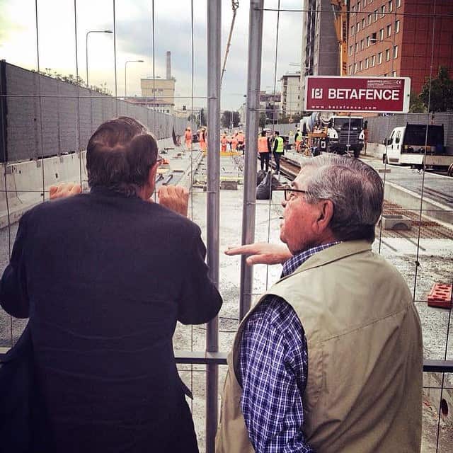 People watching roadworks