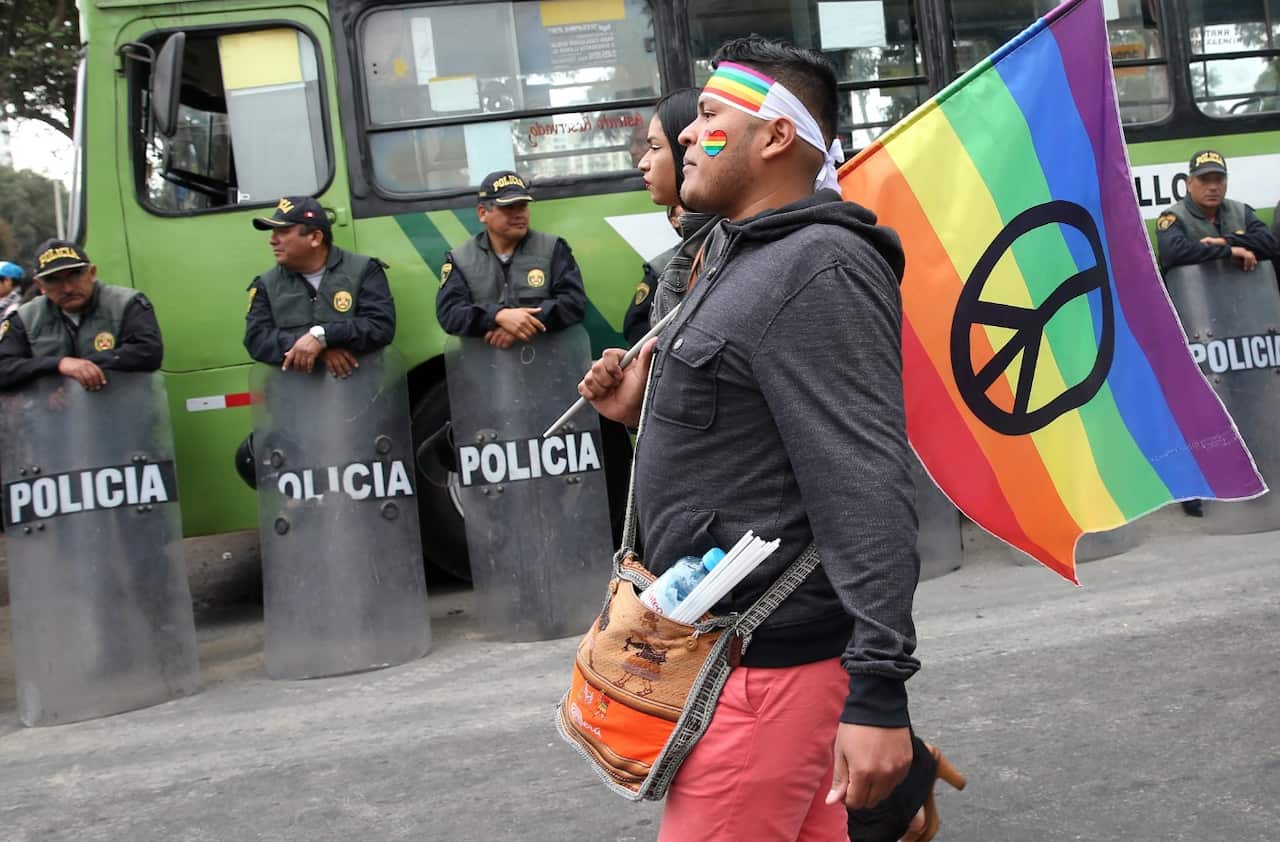 A participant marches during a rally held to celebrate World Pride Day 2017 in Lima, Peru, 01 July 2017