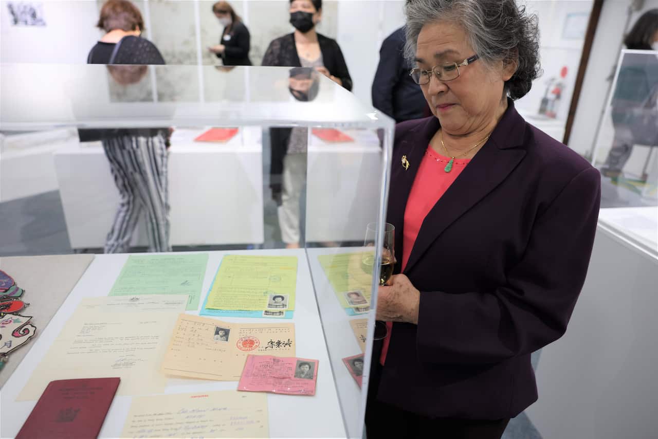 Susan Lee Moon Hing viewing the "Our Journeys I Our Stories" Exhibition at Hurstville Museum & Gallery.