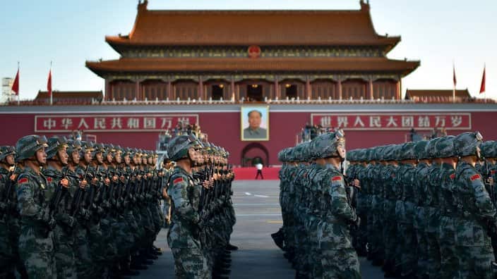 Chinese PLA (People's Liberation Army) soldiers march past the Tian'anmen Rostrum during the military parade