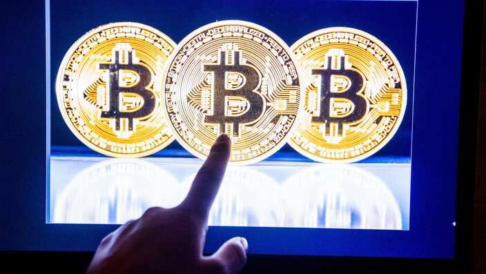 Virtual currency bitcoin hit another all-time peak on  two days after the launch of the first ever bitcoin futures on a U.S. exchang