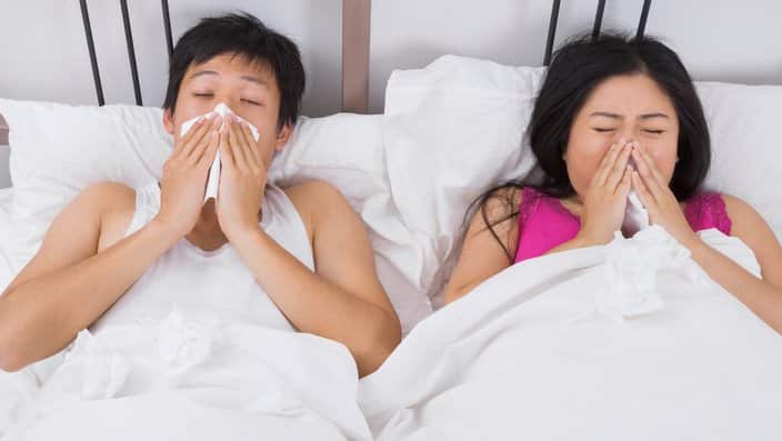 Flu deaths hit 300 as season 'passes peak'