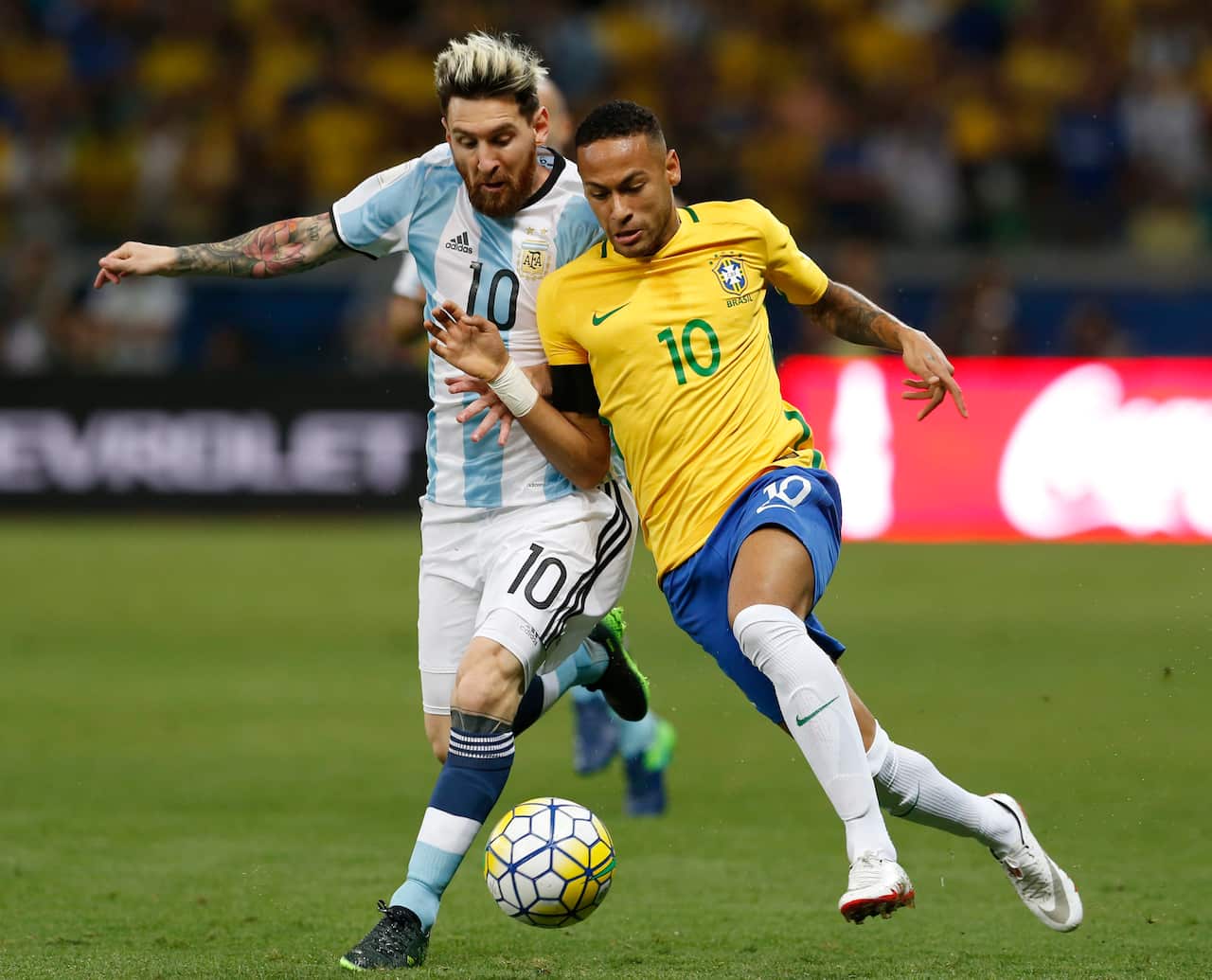 Argentina's Lionel Messi, left, and Brazil's Neymar fight for the ball during a 2018 World Cup qualifying soccer match between Brazil and Argentina at the Estadio Mineirao in Belo Horizonte, Brazil, Thursday Nov. 10, 2016.(AP Photo/Leo Correa)