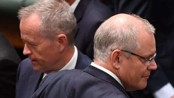 Leader of the Opposition Bill Shorten and Prime Minister Scott Morrison during division in the House of Representatives at Parliament House in Canberra, Thursday, December 6, 2018. (AAP Image/Mick Tsikas) NO ARCHIVING