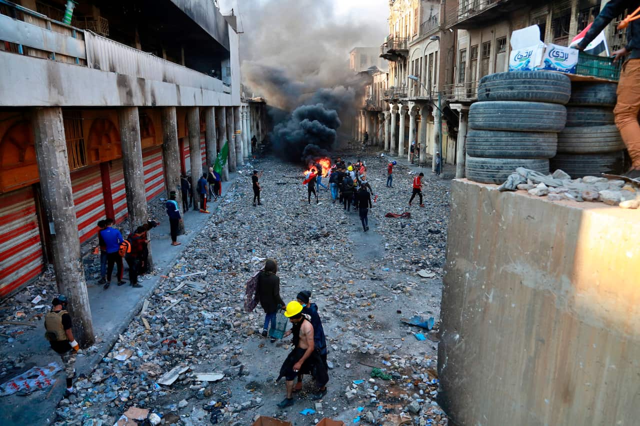  Scores of protesters have been shot dead in the last 24 hours, amid spiraling violence in Baghdad and southern Iraq, officials said. 