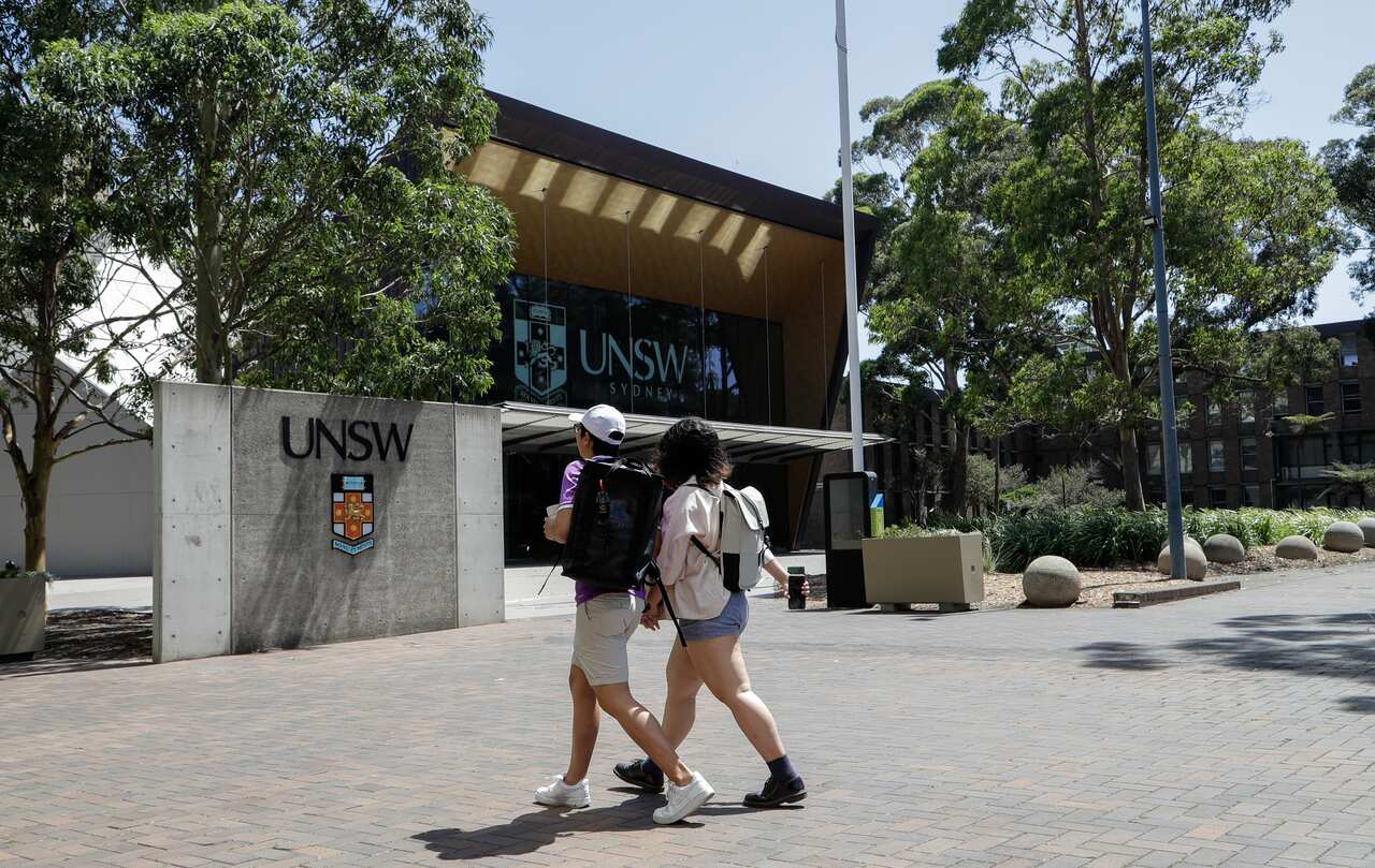 Students walk around the University of New South Wales campus in Sydney, Australia, Tuesday, Dec. 1, 2020.
