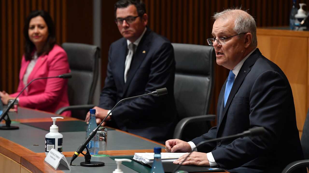 Queensland Premier Annastacia Palaszczuk, Victoria’s Premier Daniel Andrews and Prime Minister Scott Morrison at a National Cabinet press conference at Parliament House in Canberra, Friday, December 11, 2020. 