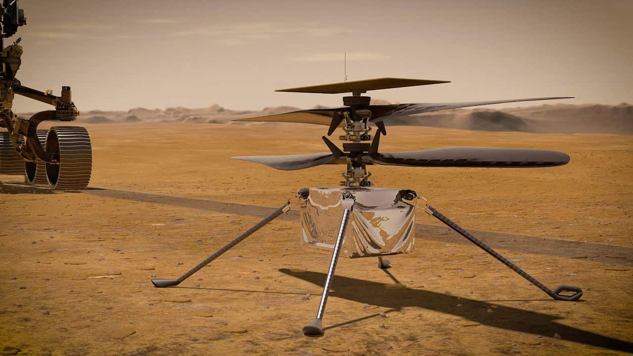 NASA's Ingenuity Mars Helicopter stands on the Red Planet's surface as NASA's Mars 2020 Perseverance rover.