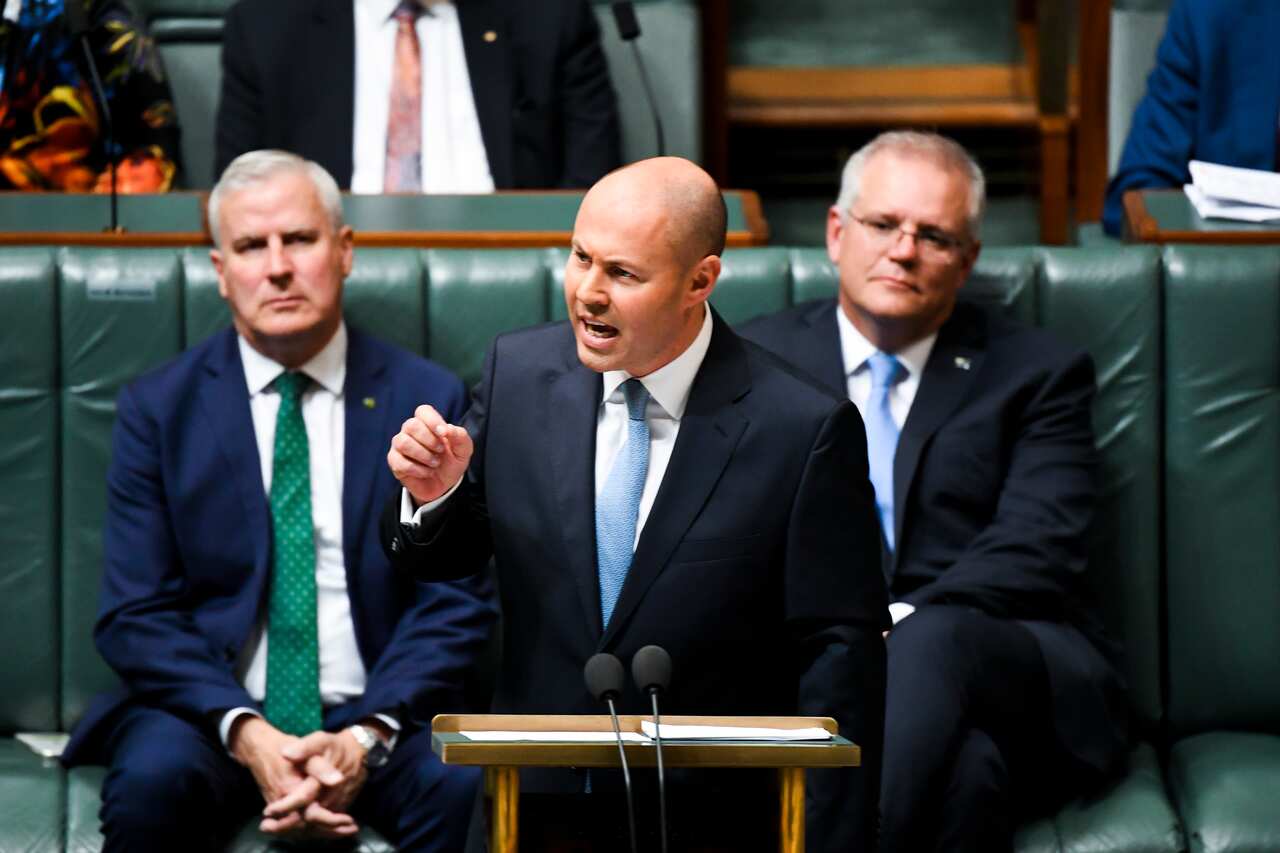 Australian Treasurer Josh Frydenberg hands down his third Federal Budget in the House of Representatives at Parliament House in Canberra, Tuesday, May 11, 2021. (AAP Image/Lukas Coch) NO ARCHIVING
