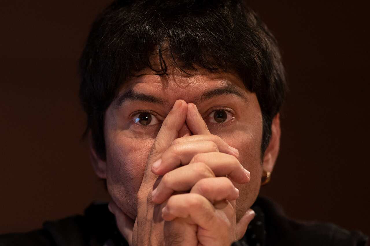 Cuban playwright and activist Yunior Garcia Aguilera gives a press conference in Madrid, Thursday, Nov. 18, 2021. Garcia is one of the Cuban organizers of a banned opposition march. (AP Photo/Bernat Armangue)