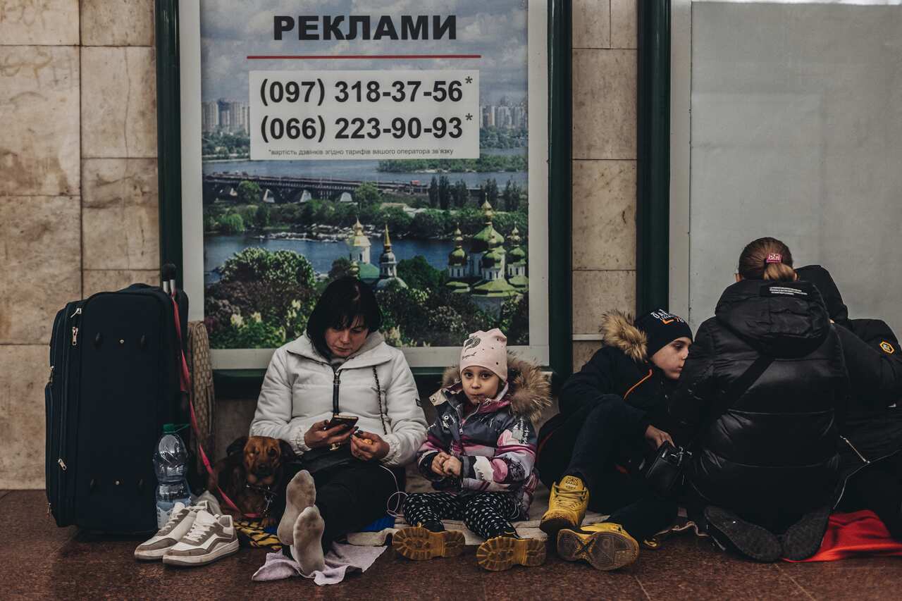 A family takes shelter in the Kiev subway, February 25, 2022, in Kiev, Ukraine.  