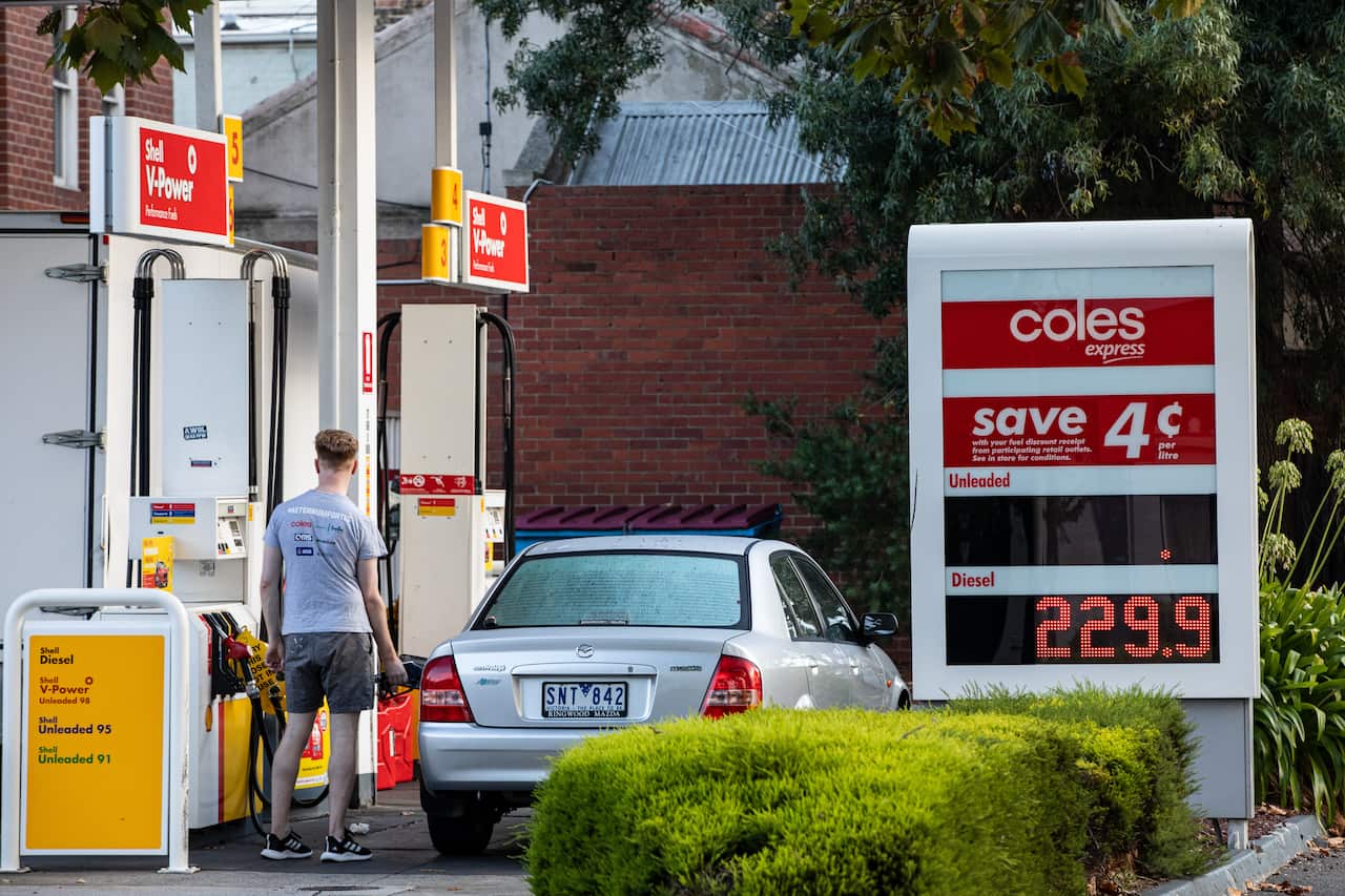 Fuel prices are listed at a petrol station in Melbourne, Monday, March 14, 2022.