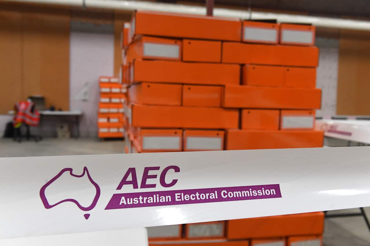 Boxes of senate ballot papers, ready for polling booths are seen at an Australian Electoral Commission (AEC) warehouse in Queanbeyan, near Canberra, Friday, March 25, 2022. (AAP Image/Mick Tsikas) NO ARCHIVING