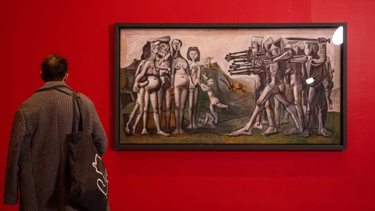 A visitor views a painting as part of The Picasso Century exhibition, at the NGV International, in Melbourne, Thursday, June 9, 2022.