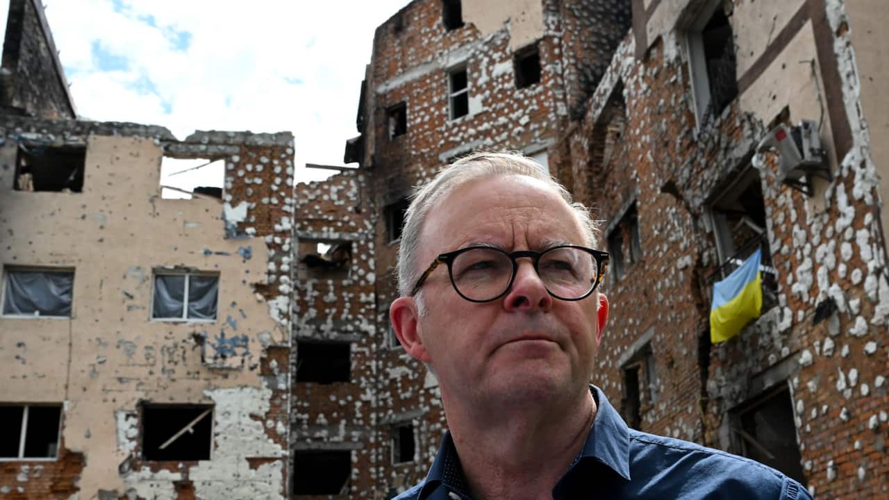 Australian Prime Minister Anthony Albanese tours damaged residential areas in Irpin on the outskirts of Kyiv, Ukraine, Sunday, July 3, 2022.