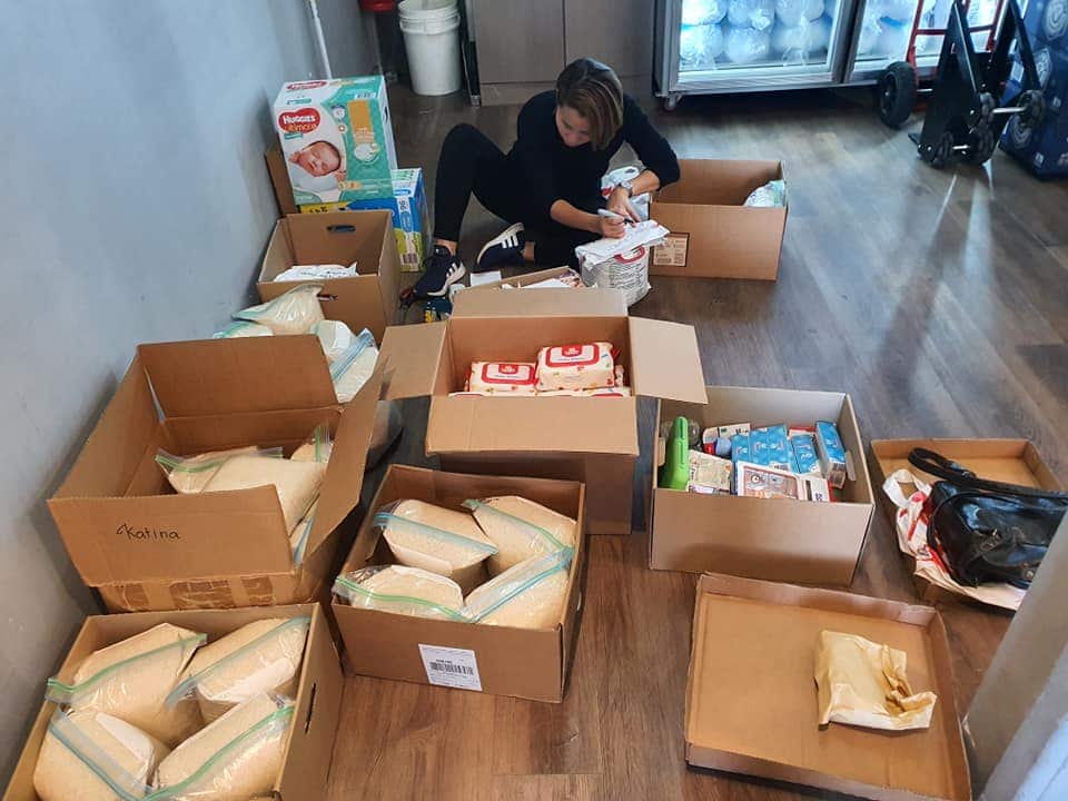 Chau Nguyen is packing up for delivery.