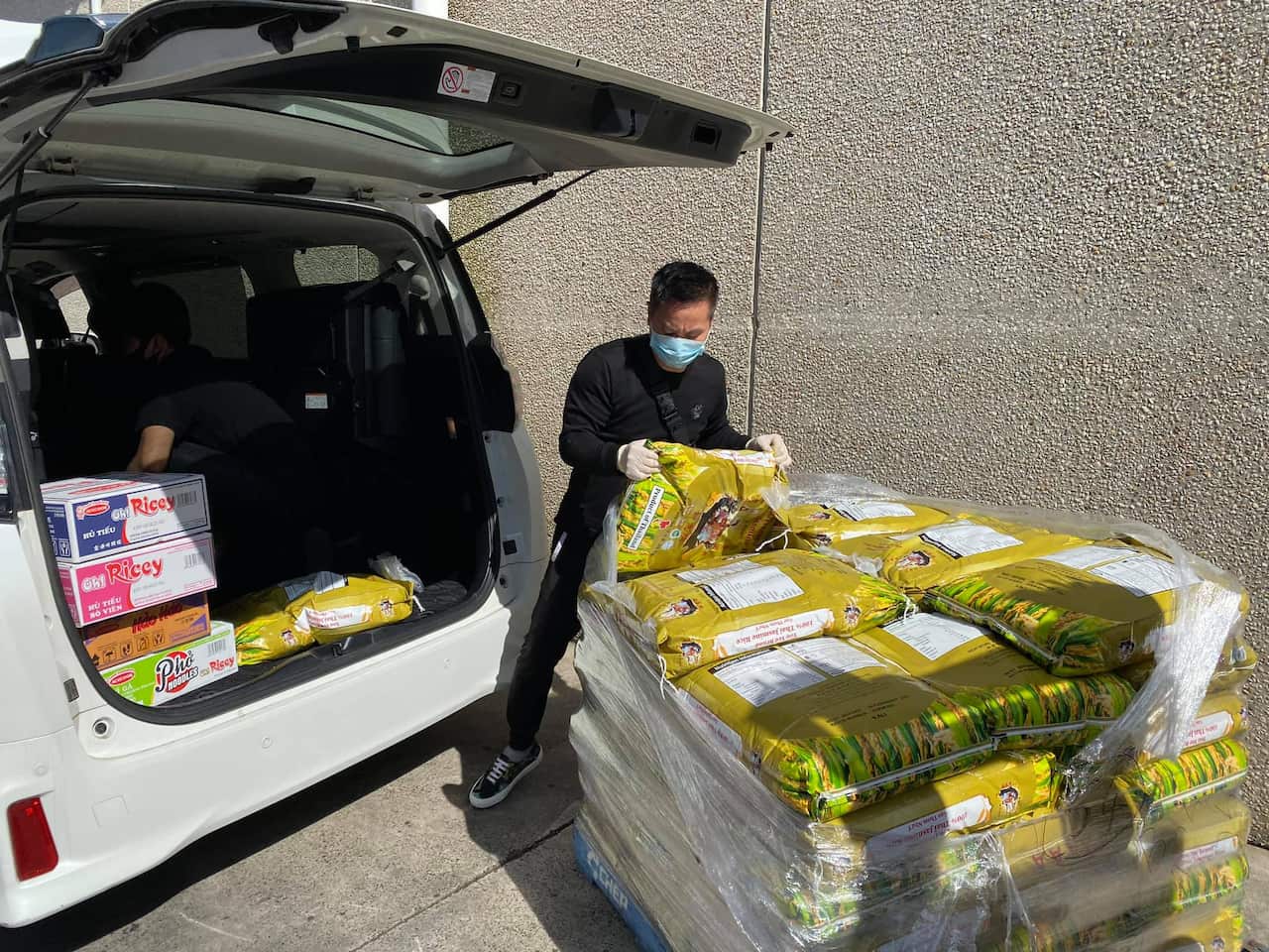Rice and instant noodle is delivered to door of those in need.