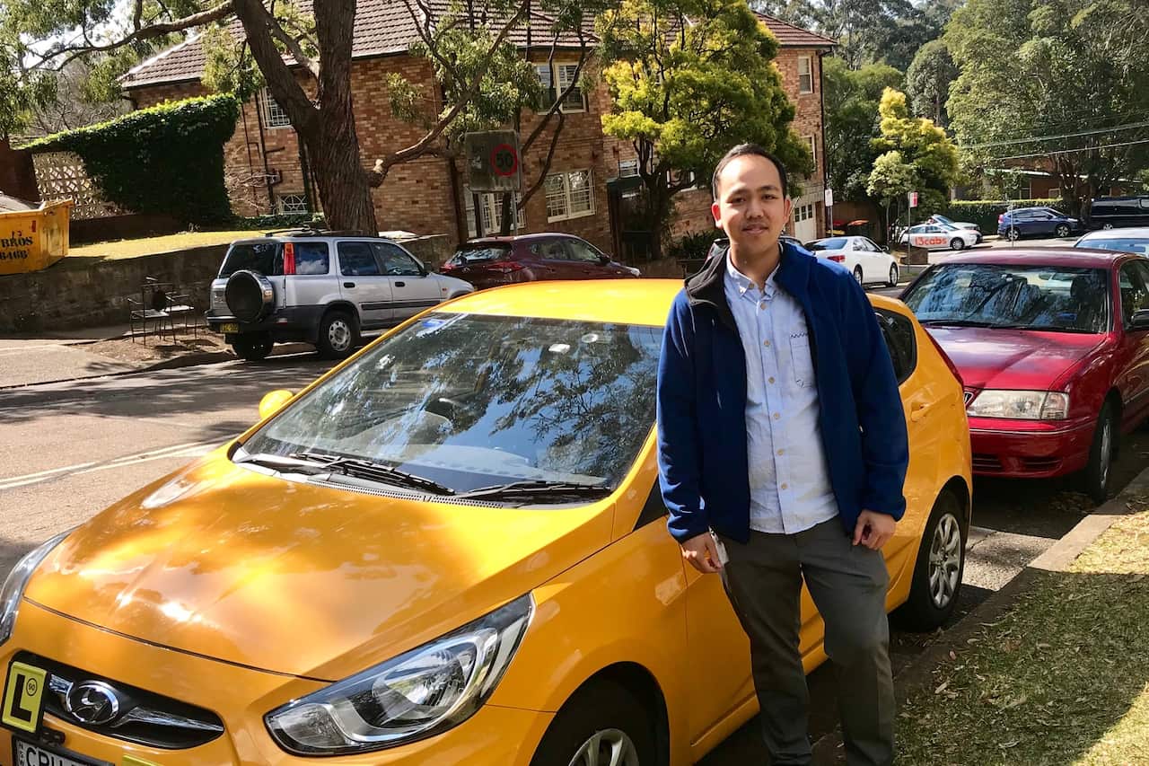 คุณธนา รามนันทน์ หรือครูปลา ครูสอนขับรถยนต์ในซิดนีย์