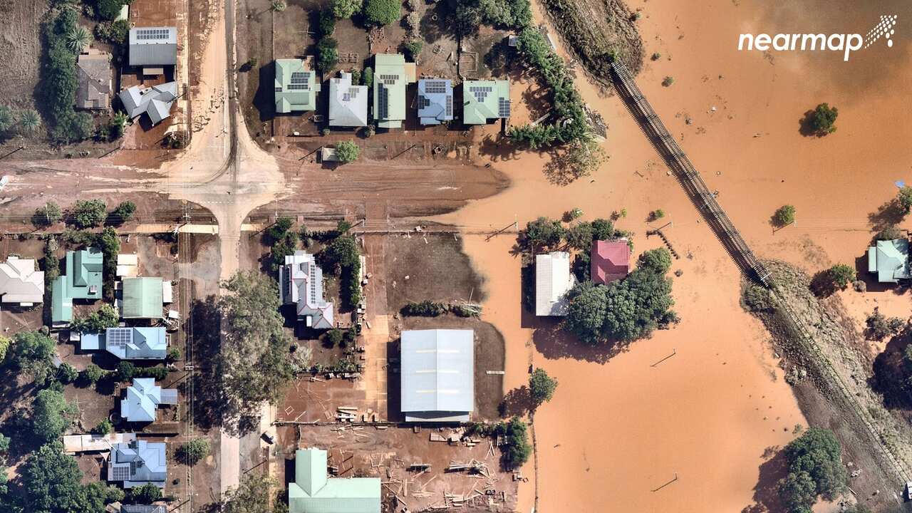 A supplied image obtained on Monday, March 14, 2022, shows flooding in North Lismore, northeastern New South Wales, on Wednesday, March 2, 2022. (AAP Image/Supplied aerial imagery by Nearmap) NO ARCHIVING, EDITORIAL USE ONLY