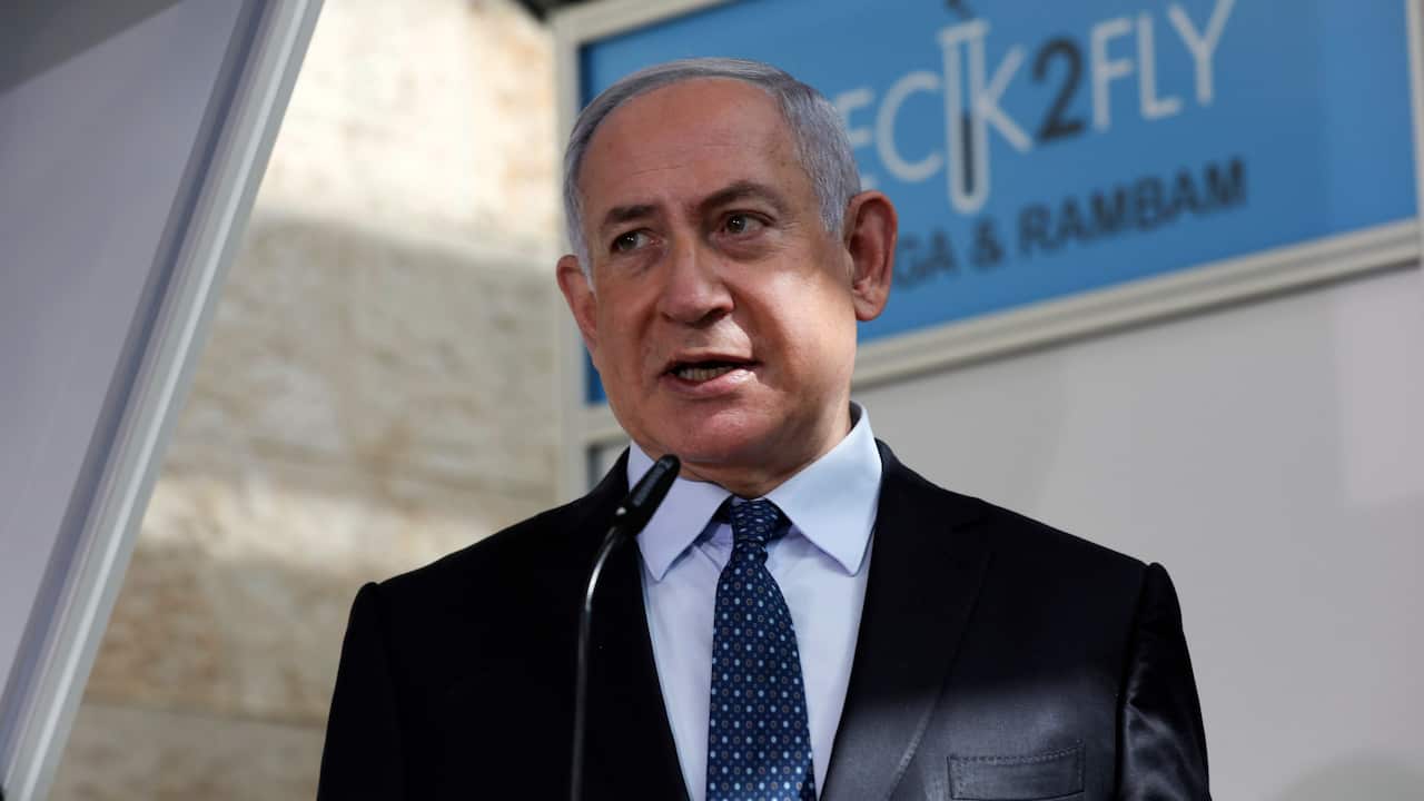 Israeli Prime Minister Benjamin Netanyahu visits a new coronavirus lab at Ben-Gurion International Airport, near Tel Aviv, Israel.