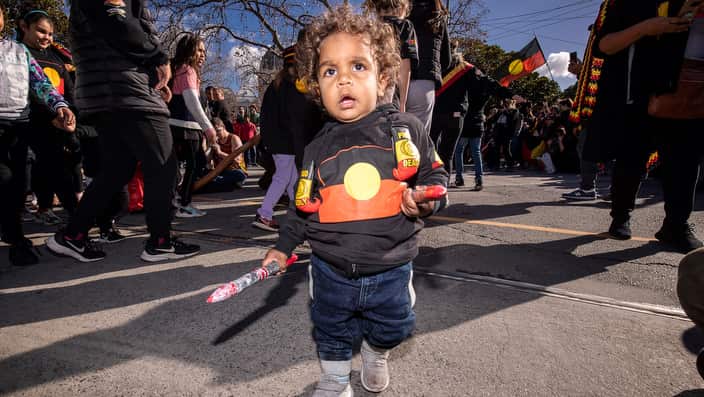 Brian Liddle Jr participates in a NAIDOC week march in Melbourne, Friday, July 6, 2018. 