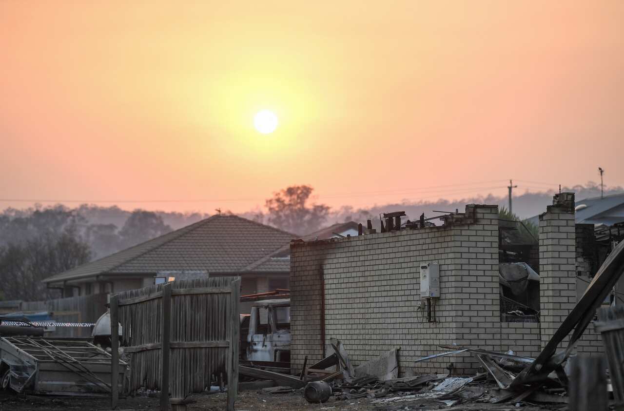 A house burnt down by bushfires is seen in Laidley, southeast Queensland, Wednesday, October 9, 2019. (AAP Image/Scott Davis) NO ARCHIVING